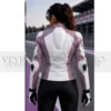 Woman in white purple moto jacket back